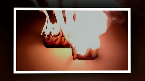 Pack of Man lights a match in darkness. Slow Motion Stock Footage 73542486