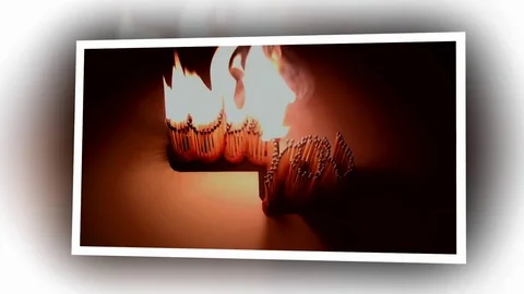 Pack of Man lights a match in darkness. Slow Motion Stock Footage 73553847