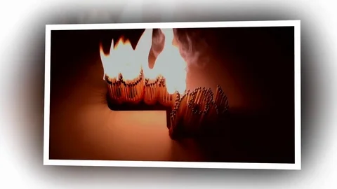 Pack of Man lights a match in darkness. Slow Motion Stock Footage 73581648