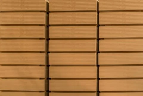 Pack of MDF laid in rows on the warehouse Stock Photos