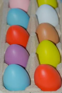In pack of multi-colored Easter eggs Stock-Fotos