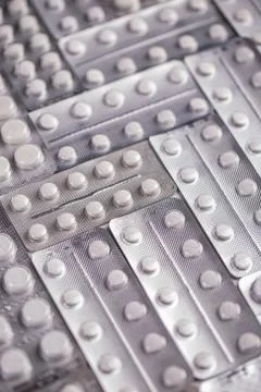 Pack of pills with tablets Stock Photos