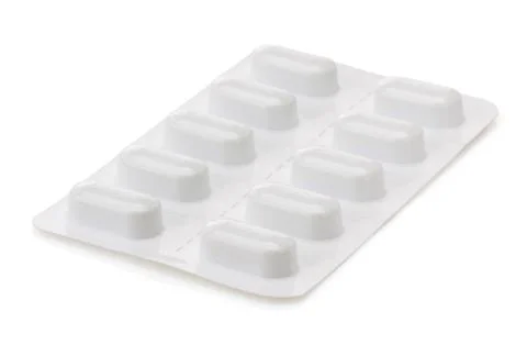 Pack of pills on white Foto stock
