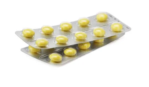 Pack of pills on white Foto stock