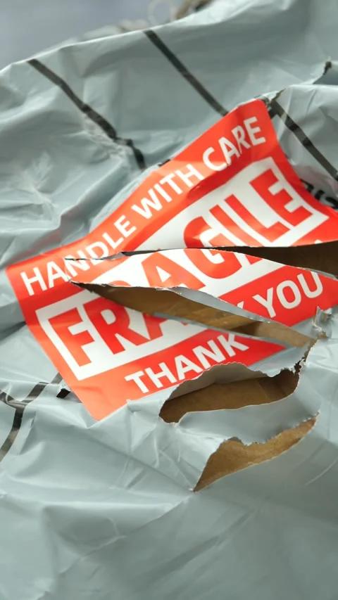 Package arrives damaged at doorstep 스톡 동영상 312844400