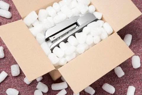 A Package Containing A Stapler Stock Photos