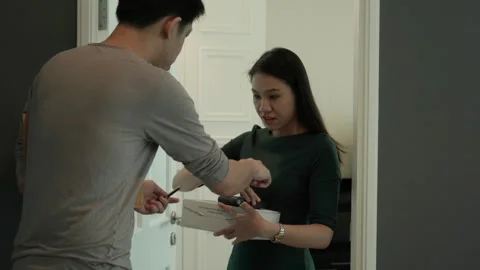 Package Delivery Interaction at Home Stock Footage 318863489