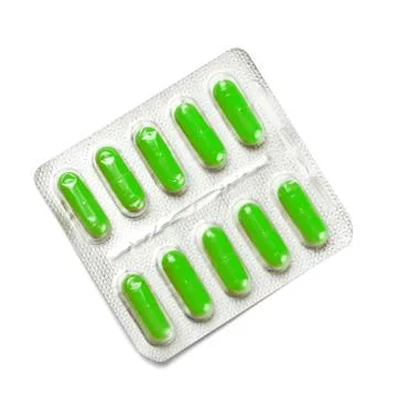 Package of green capsules Stock Photos