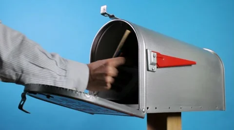 A package in the mail box Stock Footage 9187236