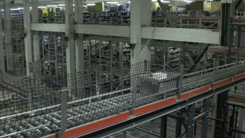 Package moves in the logistics center Stock Footage 226251209