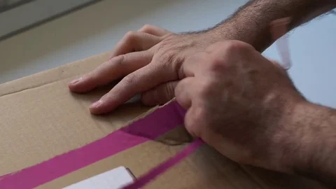 Package Opening Pull Stock Footage 82979764