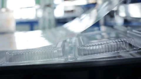 Package for pack salad and hot food. Goods manufactured of plastic packaging fro Stock Footage 199487317