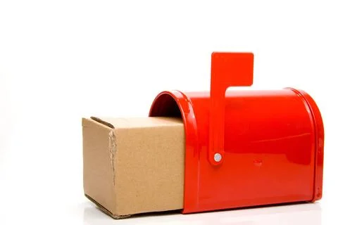 Package A parcel package box in a mailbox. Copyright: xZoonar.com/RobertxB... 库存照片