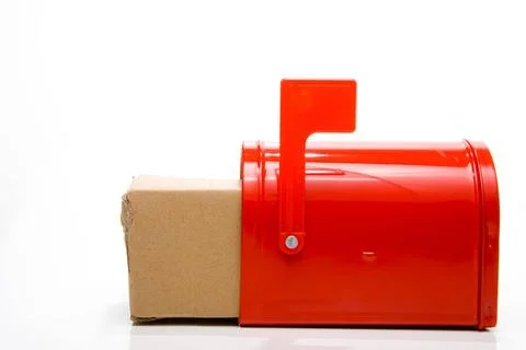 Package A parcel package box in a mailbox. Copyright: xZoonar.com/RobertxB... 写真素材