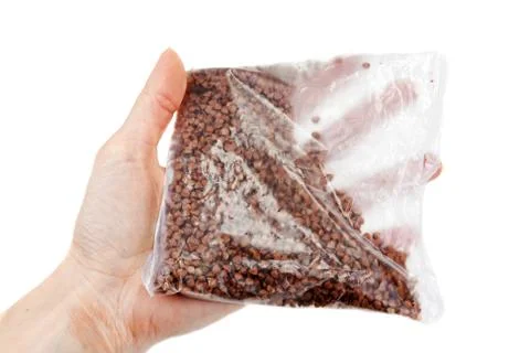 Package of the quick preparation with groats Stock Photos