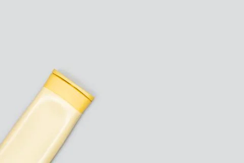 A package of shampoo on a gray background with copy space Stock Photos