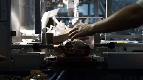 Packaged Bread Being Placed Into Cart Stock Footage 90122527