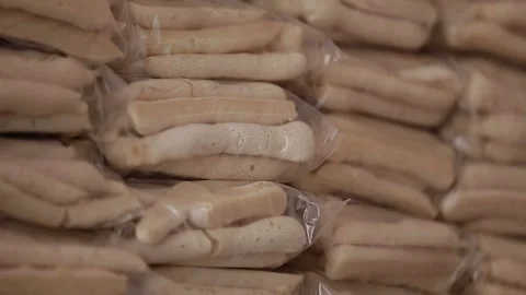 Packaged cassava starch biscuits, Natividade, Tocantins Stock Footage 317789637