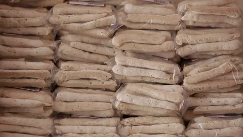 Packaged cassava starch biscuits, Natividade, Tocantins Stock Footage 317789654