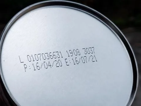 Packaged Date and Expire Date information on the bottom of the canned frozen  Stock Photos