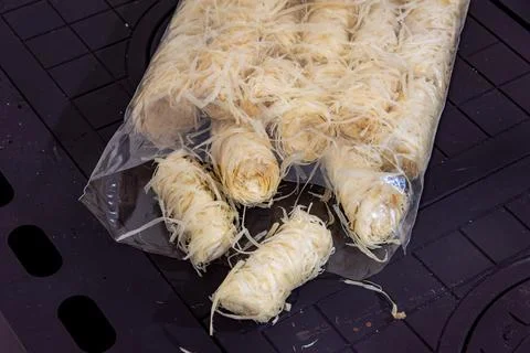 Packaged fire starter rolls made from waxed wood fibers for stoves fireplaces Stock Photos