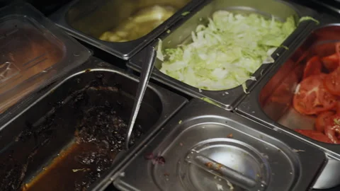 Packaged Fresh Bread Loaves in Display at Fast Food Restaurant Stock-Footage 307089109