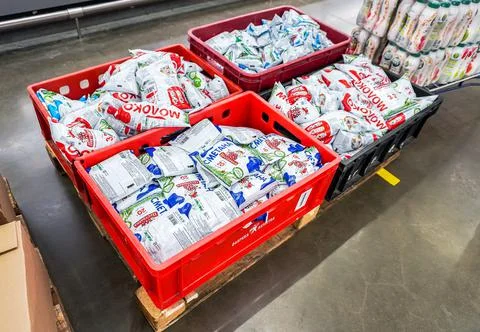 Packaged milk in plastic boxes in a superstore Stock Photos