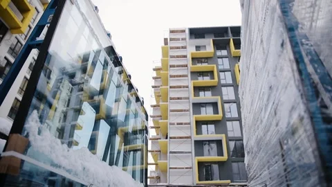 Packaged not yet installed glass for windows on the facade background of the Stock Footage 258679334