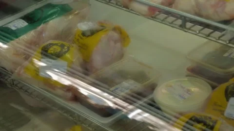 Packaged Poultry and Meat Products in Refrigerated Display at Sydney Market Stock Footage 345707446