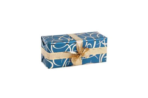 Packaged rectangular gift in blue packaging with gold bow and gold pattern on a Stock Photos