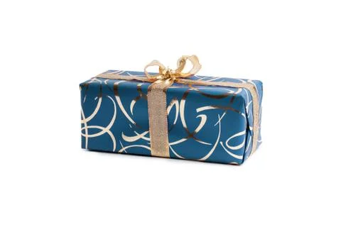 Packaged rectangular gift in blue packaging with gold bow and gold pattern on a Stock Photos