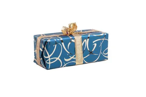 Packaged rectangular gift in blue packaging with gold bow and gold pattern on a Stock Photos