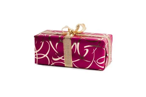 Packaged rectangular gift in dark pink packaging with gold bow and gold pattern Stock Photos