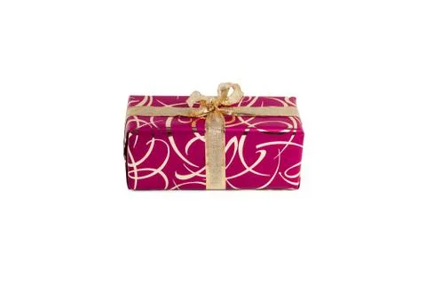 Packaged rectangular gift in dark pink packaging with gold bow and gold pattern Stock Photos