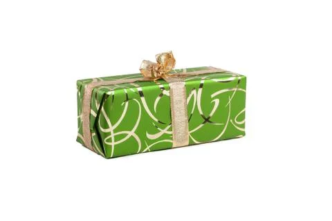 Packaged rectangular gift in green packaging with gold bow and gold pattern on a Stock Photos