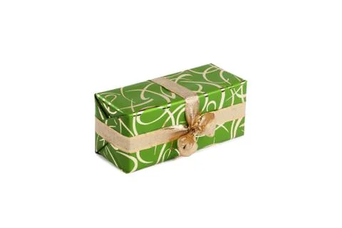 Packaged rectangular gift in green packaging with gold bow and gold pattern on a Stock Photos