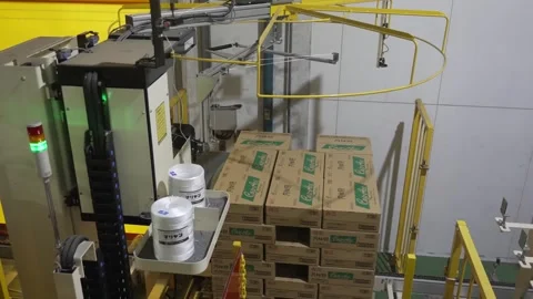 Packaged Sake and Boxes at the End of the Bottling Line Stock Footage 340010847