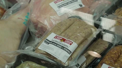 Packaged Sausages and Meat Cuts in Refrigerated Display at Sydney Market Stock Footage 345800665