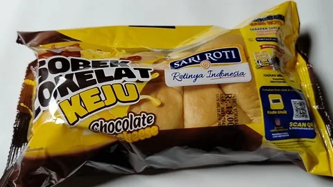 Packaged sweet bread product with chocolate and cheese flavor presented on  Stock Footage 339095913
