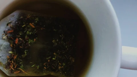 Packaged tea is brewed in a Cup Stock Footage 125081787