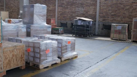 Packages and boxes in the port warehouse Stock Footage 92405494