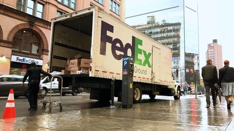 Packages back open FedEx delivery truck bright day Astor Place New York City NYC Stock Footage 106974287