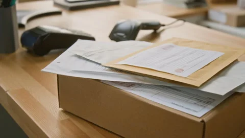 Packages, Barcode Scanner and Payment Terminal at Express Delivery Office Stock Footage 321433092