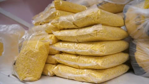 Packages of cereals on a store shelf. Corn grits. Stock-Footage 264802437