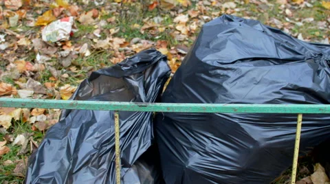 Packages with garbage on the street Stock Footage 56765756