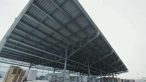 Packages of polycarbonate building materials under lean-to Stock Footage 230035865