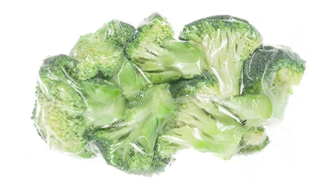 Packaging and Freezing Broccoli Pieces 4K Stock Footage 328013747