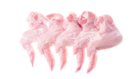Packaging and Freezing Fresh Chicken Wings 4K Stock Footage 328641727