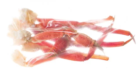 Packaging and Freezing Fresh Crab Claws 4K Stock Footage 328110424