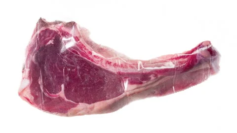 Packaging and Freezing Tomahawk Steak 4K Stock Footage 328609924